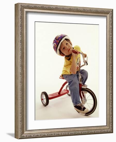 4 Year Old Boy Posing on His Tricycle, New York, New York, USA-Paul Sutton-Framed Photographic Print