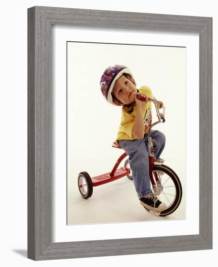 4 Year Old Boy Posing on His Tricycle, New York, New York, USA-Paul Sutton-Framed Photographic Print