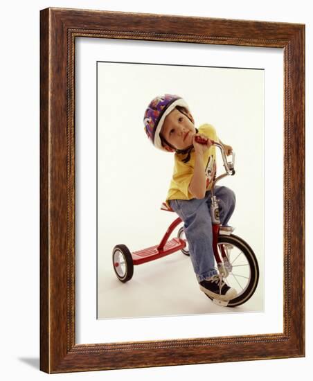 4 Year Old Boy Posing on His Tricycle, New York, New York, USA-Paul Sutton-Framed Photographic Print