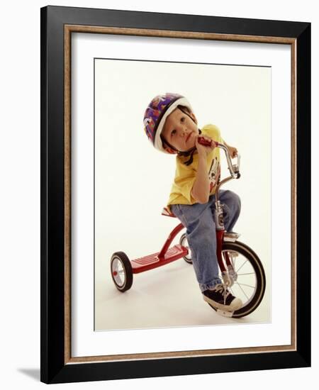 4 Year Old Boy Posing on His Tricycle, New York, New York, USA-Paul Sutton-Framed Photographic Print