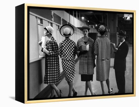 5 Models Wearing Fashionable Dress Suits at a Race Track Betting Window, at Roosevelt Raceway-Nina Leen-Framed Premier Image Canvas