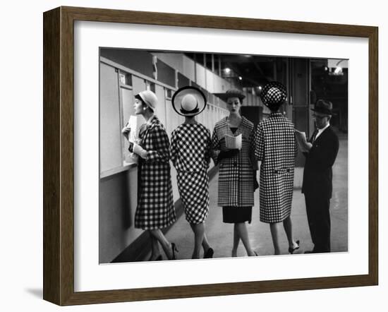 5 Models Wearing Fashionable Dress Suits at a Race Track Betting Window, at Roosevelt Raceway-Nina Leen-Framed Photographic Print