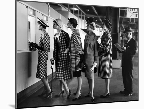5 Models Wearing Fashionable Dress Suits at a Race Track Betting Window, at Roosevelt Raceway-Nina Leen-Mounted Photographic Print