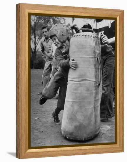 7 Year Old Tackling Dummy During Practice-Wallace Kirkland-Framed Premier Image Canvas