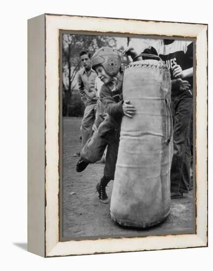 7 Year Old Tackling Dummy During Practice-Wallace Kirkland-Framed Premier Image Canvas