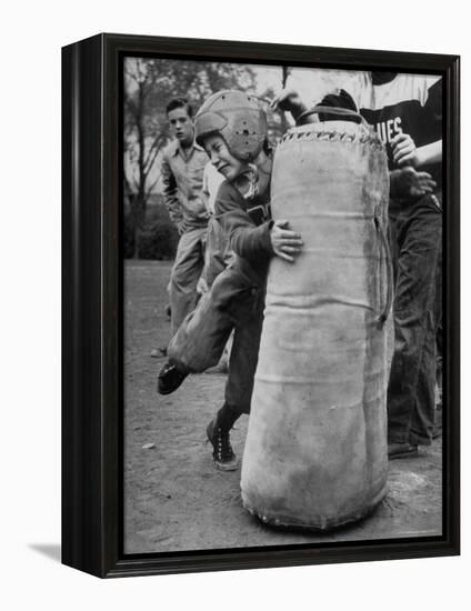 7 Year Old Tackling Dummy During Practice-Wallace Kirkland-Framed Premier Image Canvas