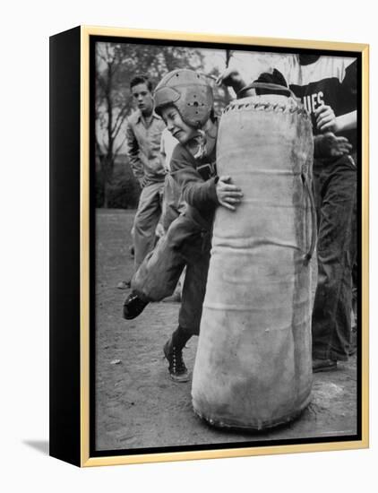 7 Year Old Tackling Dummy During Practice-Wallace Kirkland-Framed Premier Image Canvas