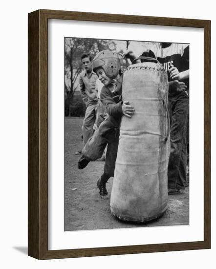 7 Year Old Tackling Dummy During Practice-Wallace Kirkland-Framed Photographic Print