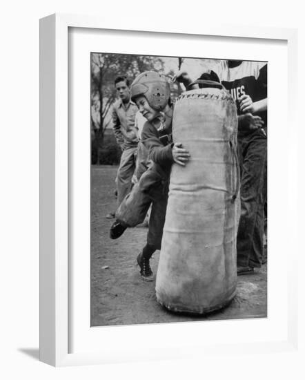 7 Year Old Tackling Dummy During Practice-Wallace Kirkland-Framed Photographic Print