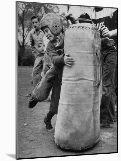 7 Year Old Tackling Dummy During Practice-Wallace Kirkland-Mounted Photographic Print