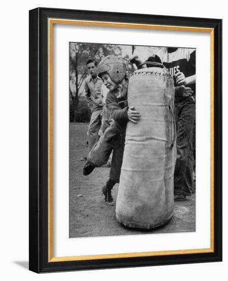 7 Year Old Tackling Dummy During Practice-Wallace Kirkland-Framed Photographic Print