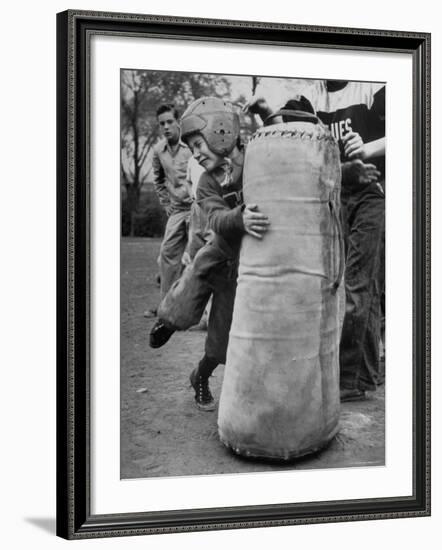 7 Year Old Tackling Dummy During Practice-Wallace Kirkland-Framed Photographic Print