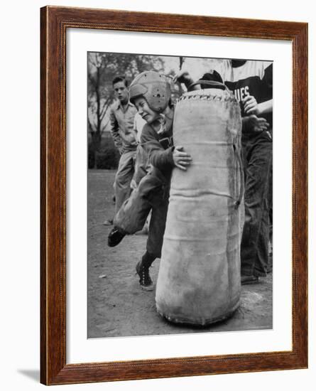 7 Year Old Tackling Dummy During Practice-Wallace Kirkland-Framed Photographic Print