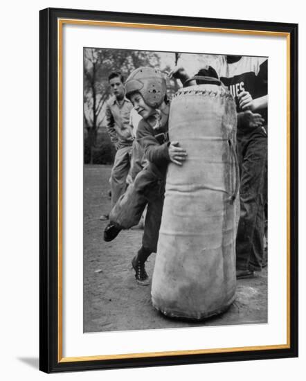 7 Year Old Tackling Dummy During Practice-Wallace Kirkland-Framed Photographic Print