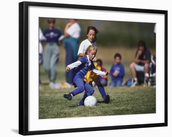 8 Year Old Girls in Action Durring Soccer Game, Lakewood, Colorado, USA-null-Framed Photographic Print