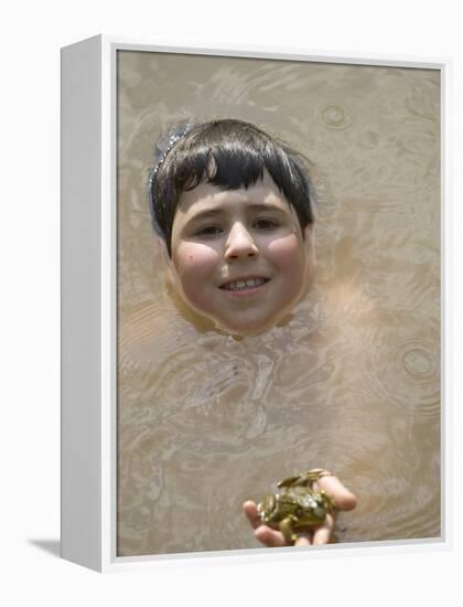 9 Year Old Boy Showing Off His Frog in a Pond, Woodstock, New York, USA-Paul Sutton-Framed Premier Image Canvas