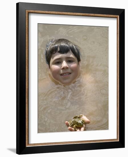 9 Year Old Boy Showing Off His Frog in a Pond, Woodstock, New York, USA-Paul Sutton-Framed Photographic Print