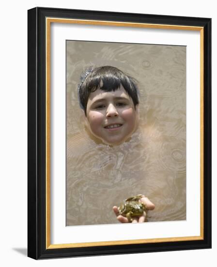 9 Year Old Boy Showing Off His Frog in a Pond, Woodstock, New York, USA-Paul Sutton-Framed Photographic Print