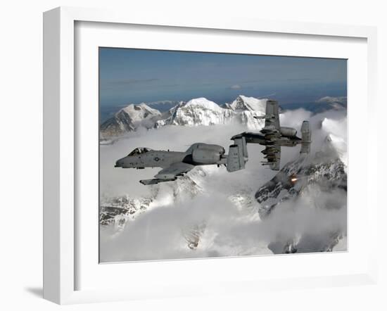 A-10 Thunderbolt II's Fly Over Mountainous Landscape-Stocktrek Images-Framed Photographic Print