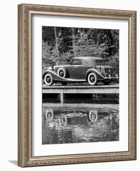 A 1933 Hispano-Suiza K6 Reflected in a Lake-null-Framed Photographic Print