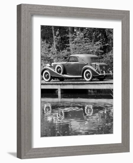 A 1933 Hispano-Suiza K6 Reflected in a Lake-null-Framed Photographic Print