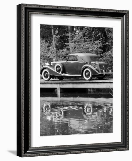 A 1933 Hispano-Suiza K6 Reflected in a Lake-null-Framed Photographic Print