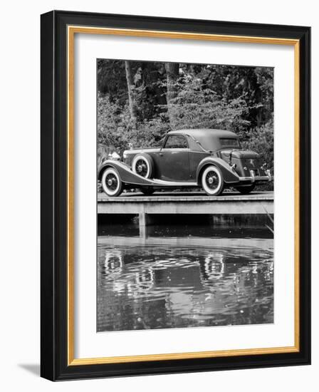 A 1933 Hispano-Suiza K6 Reflected in a Lake-null-Framed Photographic Print