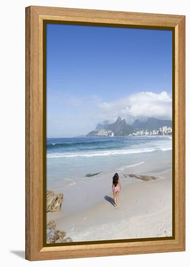 A 20-25 Year Old Young Brazilian Woman on Ipanema Beach with the Morro Dois Irmaos Hills-Alex Robinson-Framed Premier Image Canvas