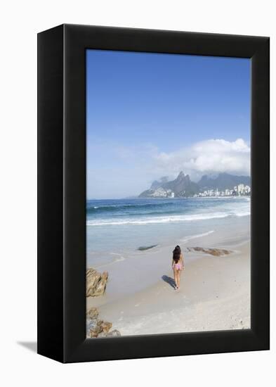 A 20-25 Year Old Young Brazilian Woman on Ipanema Beach with the Morro Dois Irmaos Hills-Alex Robinson-Framed Premier Image Canvas