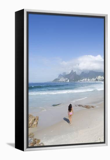 A 20-25 Year Old Young Brazilian Woman on Ipanema Beach with the Morro Dois Irmaos Hills-Alex Robinson-Framed Premier Image Canvas