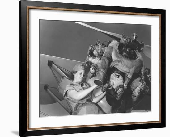 A 20 Year Old Woman and Expert Aviation Mechanic Rebuilding an Airplane Engine-Stocktrek Images-Framed Photographic Print