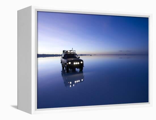 A 4X4 Rests in the Early Am Reflection in a Flooded Salt Flat In-Sergio Ballivian-Framed Premier Image Canvas