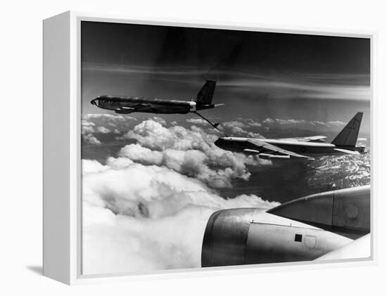 A B-52 of the United States Strategic Command Refuelled In-Flight by a KC 135 Aircraft-null-Framed Premier Image Canvas