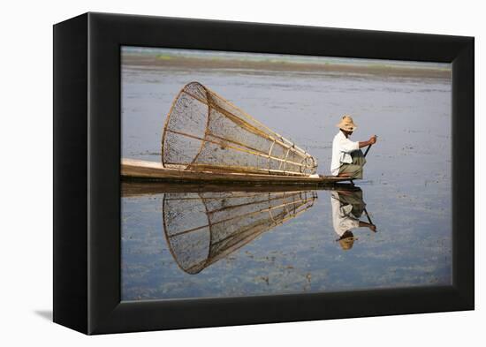 A basket fisherman on Inle Lake scans the still and shallow water for signs of life, Shan State, My-Alex Treadway-Framed Premier Image Canvas