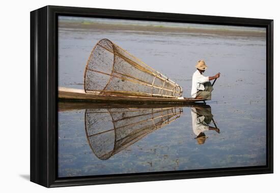 A basket fisherman on Inle Lake scans the still and shallow water for signs of life, Shan State, My-Alex Treadway-Framed Premier Image Canvas