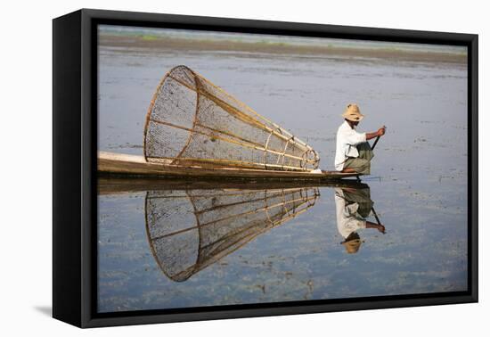 A basket fisherman on Inle Lake scans the still and shallow water for signs of life, Shan State, My-Alex Treadway-Framed Premier Image Canvas