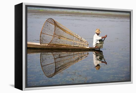 A basket fisherman on Inle Lake scans the still and shallow water for signs of life, Shan State, My-Alex Treadway-Framed Premier Image Canvas