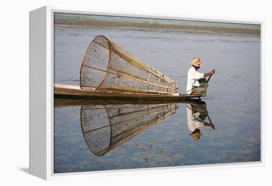 A basket fisherman on Inle Lake scans the still and shallow water for signs of life, Shan State, My-Alex Treadway-Framed Premier Image Canvas