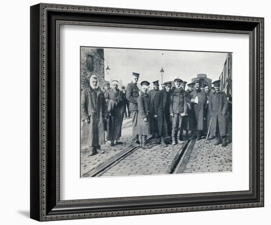A batch of Neuve Chapelle wounded on a French railway station, 1915-Unknown-Framed Photographic Print