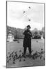 A Bird Charmer, Paris, 1931-Ernest Flammarion-Mounted Giclee Print