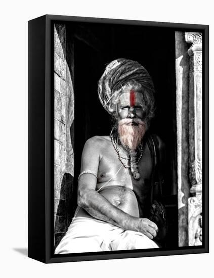 A black and white picture of a sadhu (yogi) at Pashupatinath Temple in Kathmandu, Nepal-David Chang-Framed Premier Image Canvas