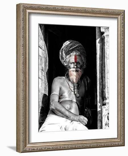 A black and white picture of a sadhu (yogi) at Pashupatinath Temple in Kathmandu, Nepal-David Chang-Framed Photographic Print