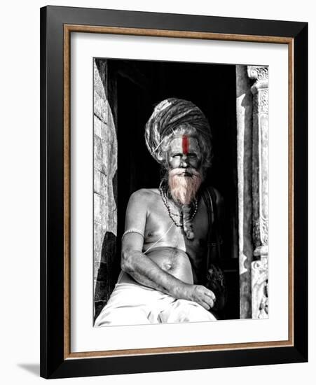 A black and white picture of a sadhu (yogi) at Pashupatinath Temple in Kathmandu, Nepal-David Chang-Framed Photographic Print