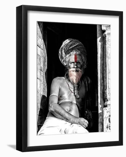 A black and white picture of a sadhu (yogi) at Pashupatinath Temple in Kathmandu, Nepal-David Chang-Framed Photographic Print