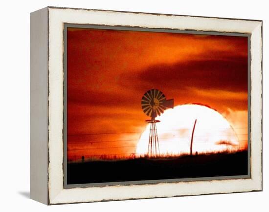 A Blazing Sun Drops Behind a Windmill-null-Framed Premier Image Canvas