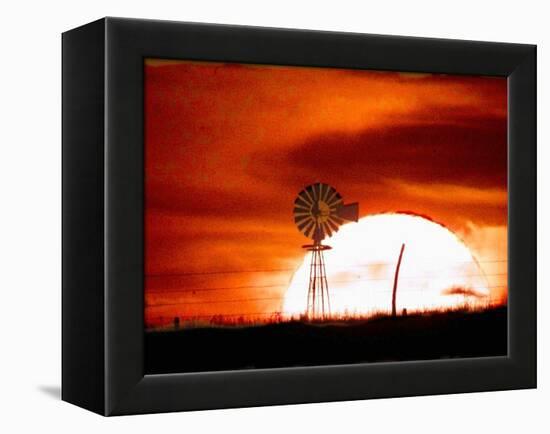 A Blazing Sun Drops Behind a Windmill-null-Framed Premier Image Canvas