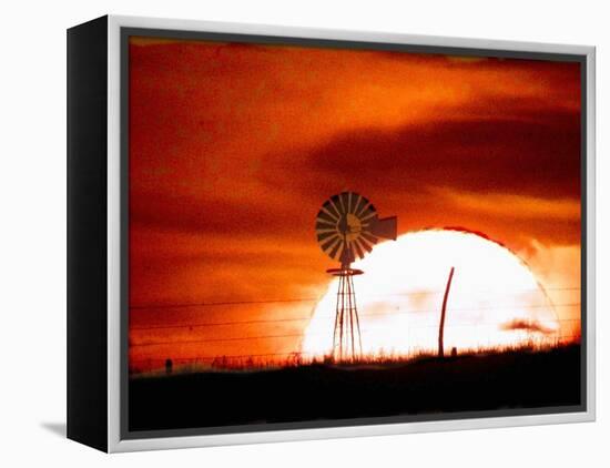 A Blazing Sun Drops Behind a Windmill-null-Framed Premier Image Canvas