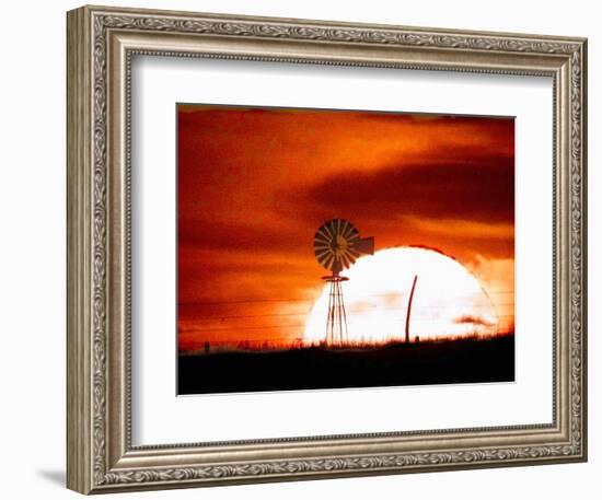 A Blazing Sun Drops Behind a Windmill-null-Framed Photographic Print