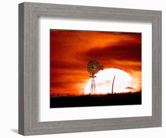 A Blazing Sun Drops Behind a Windmill-null-Framed Photographic Print