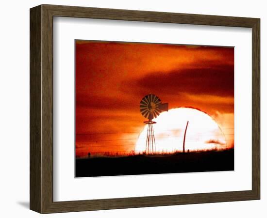 A Blazing Sun Drops Behind a Windmill-null-Framed Photographic Print
